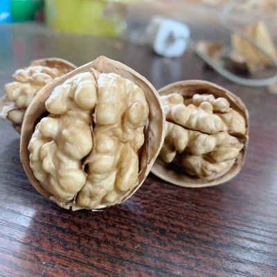 185纸皮核桃 新疆薄皮核桃休闲干果零食5斤包邮 手剥原味大核桃图4